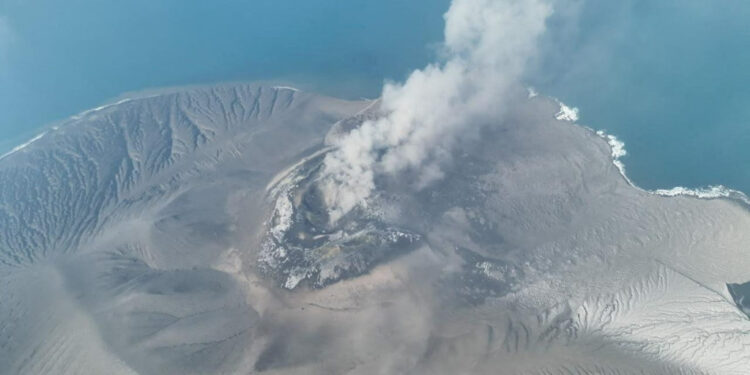 A drone view shows Mount Anak Krakatau volcano spewing hot ash during an eruption in South Lampung