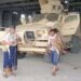 Screengrab of a video from Houthi-run Al Masirah TV showing an armed man walks next to an armoured vehicle in Mocha, Yemen, after the Houthis reportedly seized the Red Sea port city (10 September 2026)